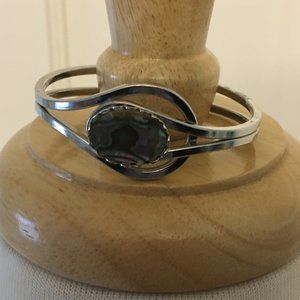 Silver plated bracelet with green swirl stone